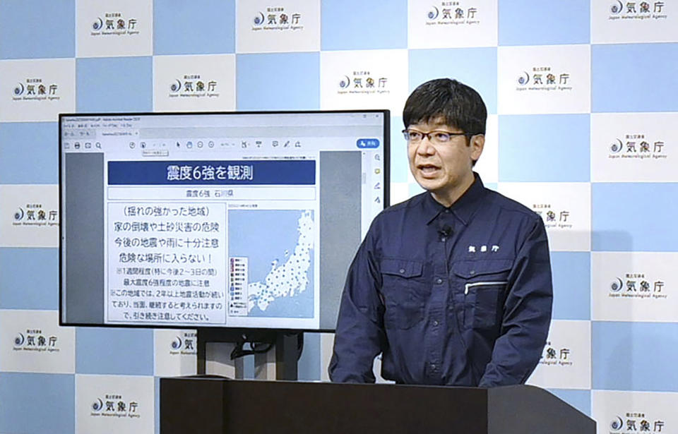 A Japan Meteorological agency official speaks after a strong earthquake hit Friday afternoon near central Japan, during a press conference, in Tokyo, Friday, May 5, 2023. (Kyodo News via AP)