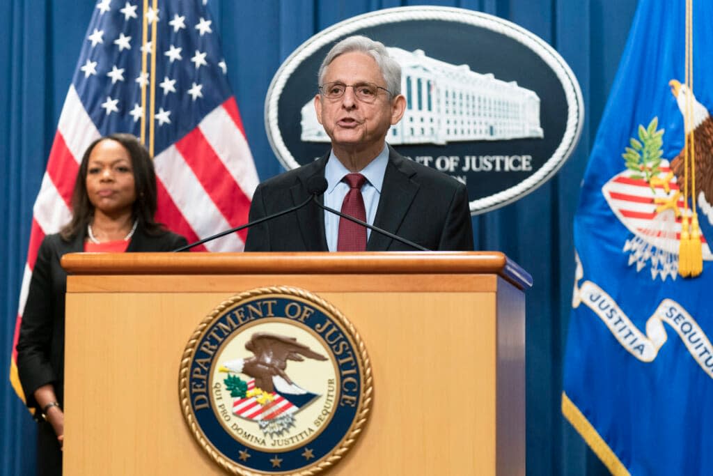 Attorney General Merrick Garland with Assistant Attorney General Kristen Clarke for the Civil Rights Division, speaks during a news conference at the Department of Justice in Washington, Thursday, Aug. 4, 2022. (AP Photo/Manuel Balce Ceneta)