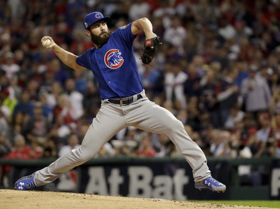 Chicago Cubs starting pitcher Jake Arrieta throws against the Cleveland Indians during the first inning.