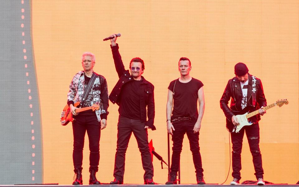 U2 salute the crowd at Twickenham Stadium - Credit: WireImage