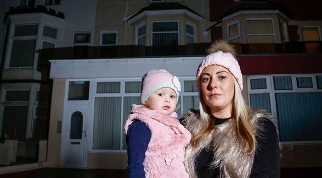 Natasha and her daughter Dolly outside the building. Photo: SWNS