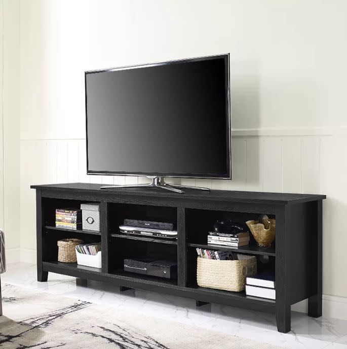 Was:&nbsp;$349.00<br /><strong>Now: $158.18</strong><br /><br />Get it <a href="https://www.wayfair.com/furniture/pdp/beachcrest-home-sunbury-70-tv-stand-with-optional-fireplace-bcmh3282.html?piid=24620047%2C24620055&amp;ds=135568" target="_blank">here</a>.