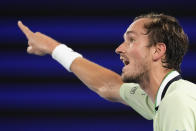 Daniil Medvedev of Russia gestures as he argues with chair umpire Jaume Campistol during a break in his semifinal against Stefanos Tsitsipas of Greece at the Australian Open tennis championships in Melbourne, Australia, Friday, Jan. 28, 2022. (AP Photo/Simon Baker)