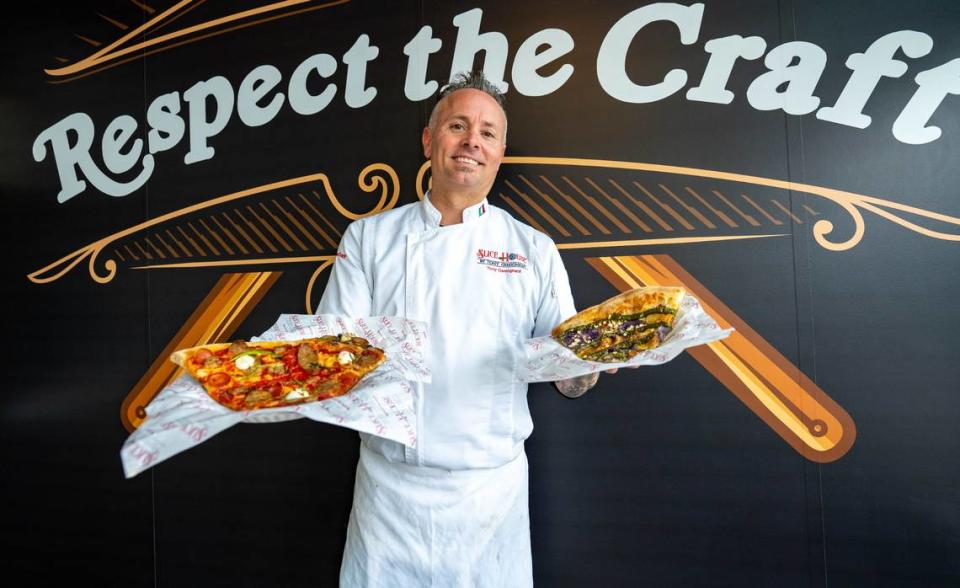 Tony Gemignani, Slice House franchise owner, holds a New York style pizza, left, and a Purple Potato pizza, right, on Thursday, Feb. 1, 2024.