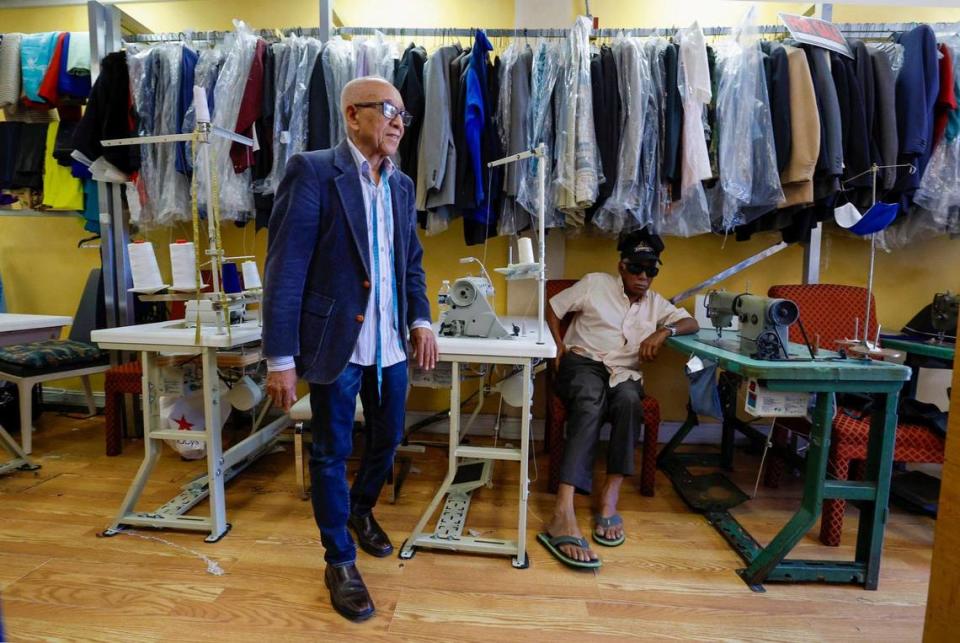 Tailor Fidel Aquino stands in his shop in Allapattah on Wednesday, Sept. 20, 2023. He’s been working as a tailor since he was 14 in the Dominican Republic.