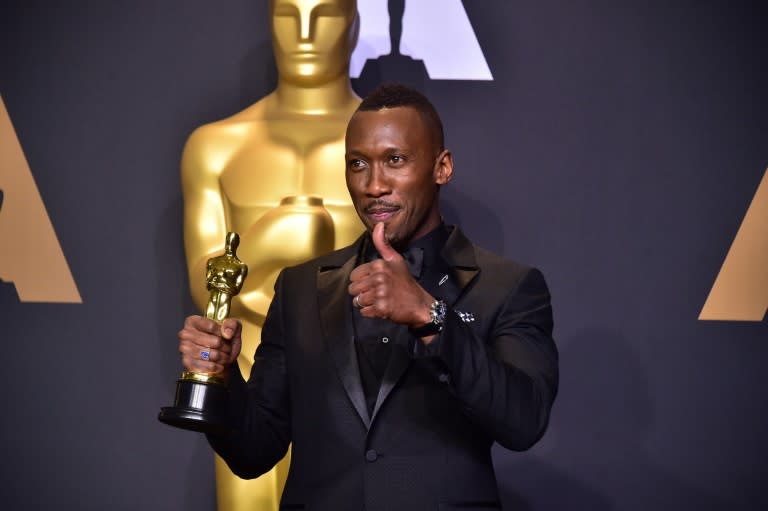 Mahershala Ali poses with the Oscar for best actor in a supporting role on February 26, 2017