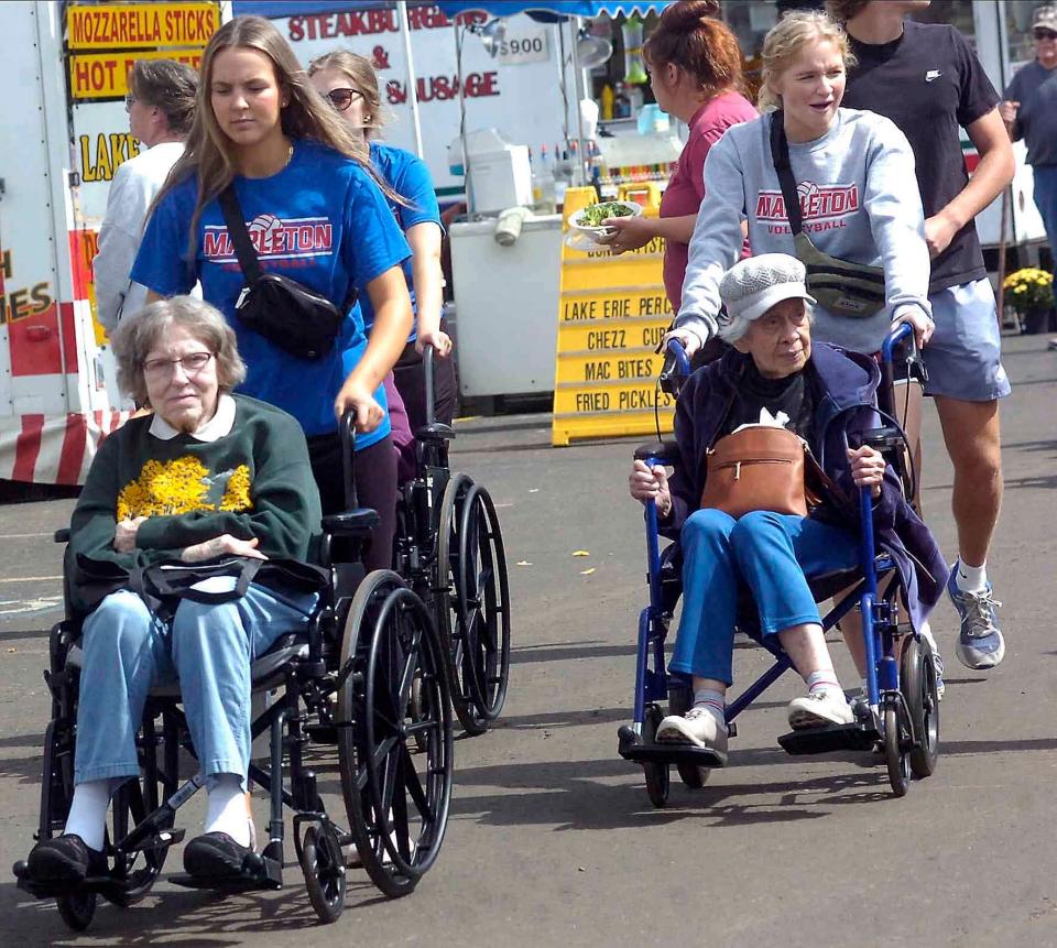 Seniors mosey around the fairgrounds on Senior Citizens Day Tuesday