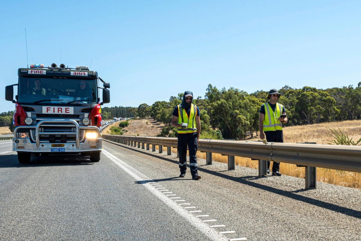 In this photo provided by the Department of Fire and Emergency Services, its members search for a radioactive capsule believed to have fallen off a truck being transported on a freight route on the outskirts of Perth, Australia, . A mining corporation on Sunday apologized for losing the highly radioactive capsule over a 1,400-kilometer (870-mile) stretch of Western Australia, as authorities combed parts of the road looking for the tiny but dangerous substance Radioactive Capsule, Perth, Australia - 28 Jan 2023