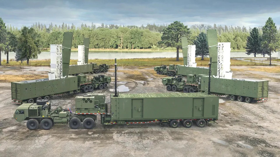 Four launchers and a command vehicle that are part of the US Army's Typhon ground-based missile launch system, which can fire SM-6 and Tomahawk missiles.<em> US Army</em>