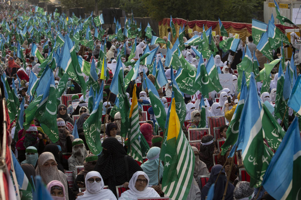 Supporters of Pakistani religious party Jamaat-e-Islami rally to express solidarity with Indian Kashmiris, in Islamabad, Pakistan, Wednesday, Oct. 16, 2019. Pakistani and Indian troops traded fire in the disputed Himalayan region of Kashmir on Wednesday, killing four civilians and wounding nearly a dozen others, officials from both sides said, as tensions remain high between the two South Asian countries. (AP Photo/B.K. Bangash)