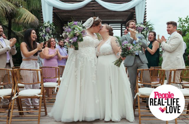 <p>Kelly Balch</p> Sarah and Jenna Capps sharing a kiss at their wedding in Mexico on Oct. 24, 2023