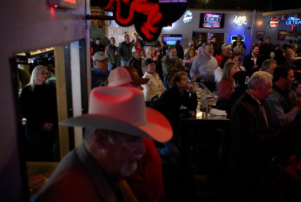 Supporters listen as Texas House Speaker Dade Phelan addresses the crowd alongside former Gov. Rick Perry at a Get Out the Vote Rally on Thursday, February 29, 2024, in Vidor, Texas. Deep fissures within the Republican Party have placed Phelan as the No. 1 enemy of Texas’ far-right conservatives.