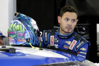 FILE - In this Feb. 14, 2020, file photo, Kyle Larson gets ready to climb into his car to practice for the NASCAR Daytona 500 auto race at Daytona International Speedway in Daytona Beach, Fla. He was supposed to be the top free agent this year but was banished to sprint cars after his firing five months ago. Larson is awaiting the appropriate time to apply for reinstatement to NASCAR and if sponsors agree to forgive him, he should get a job. (AP Photo/Terry Renna, File)