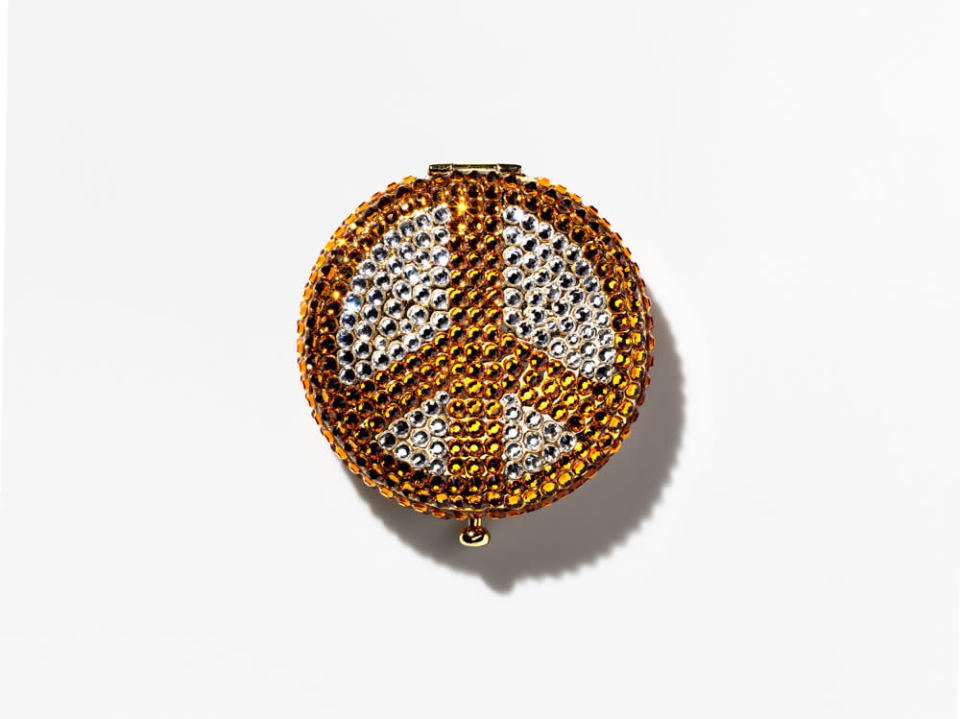 <p>The peace sign is a message that never goes out of style. (Photo: Henry Leutwyler)</p>