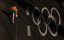 LONDON, ENGLAND - AUGUST 12: Michael Shelley of Australia competes in the Men's Marathon on Day 16 of the London 2012 Olympic Games on the streets of London on August 12, 2012 in London, England. (Photo by Ezra Shaw/Getty Images)