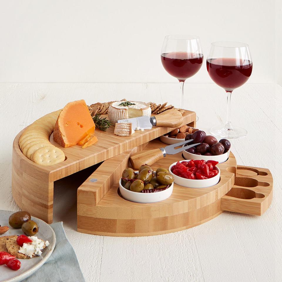 <p><a href="https://go.redirectingat.com?id=74968X1596630&url=https%3A%2F%2Fwww.uncommongoods.com%2Fproduct%2Fcompact-swivel-cheese-tapas-board&sref=https%3A%2F%2Fwww.veranda.com%2Ffood-recipes%2Fg45418269%2Fbest-charcuterie-boards-hosting%2F" rel="nofollow noopener" target="_blank" data-ylk="slk:Shop Now;elm:context_link;itc:0;sec:content-canvas" class="link ">Shop Now</a></p><p>Compact Swivel Cheese & Tapas Board</p><p>uncommongoods.com</p><p>$85.00</p>