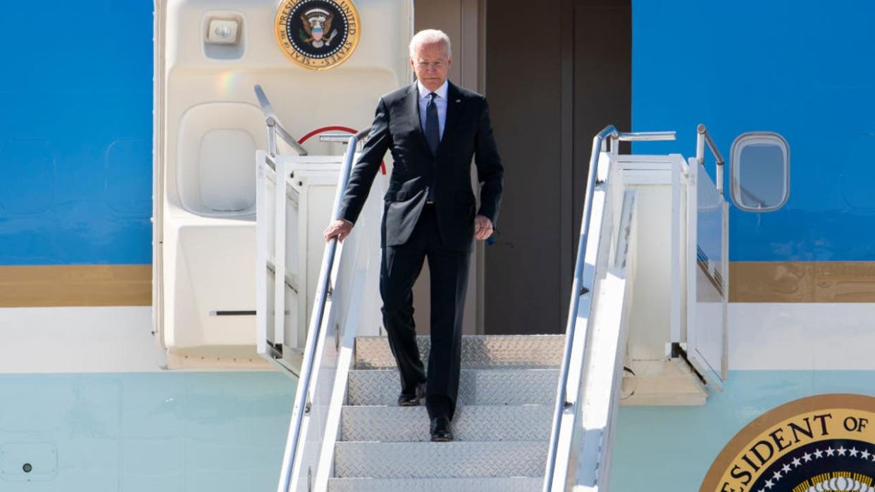 <div>US president Joe Biden disembarks from Airforce One after arriving in Geneva. (Photo by Martial Trezzini - Pool/Keystone via Getty Images)</div>