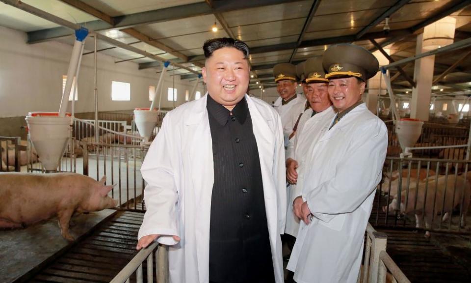 This undated picture released by North Korea’s official Korean Central News Agency shows North Korean leader Kim Jong-Un visiting a pig farm at Taechon Air Base of the Korean People’s Army.