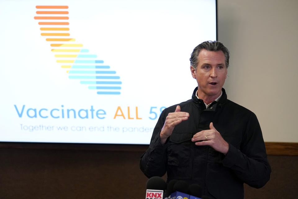 FILE - In this March 10, 2021, file photo, California Gov. Gavin Newsom addresses the media during a visit to a vaccination center in South Gate, Calif. California is expanding its vaccine eligibility to anyone 50 and over starting in April and anyone 16 and over on April 15. Gov. Newsom said Thursday, March 25, 2021, that California expects to receive 2.5 million doses a week in the first half of April and more than 3 million a week in the second half of the month. (AP Photo/Marcio Jose Sanchez, File)