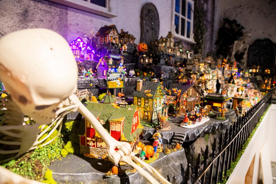 Halloween-themed village pieces are seen as the Enesco Gift Shop & Gallery Featuring Department 56 exhibit is put together before its opening Thursday at Graceland Crossing in Memphis, Tenn., on Wednesday, November 15, 2023.