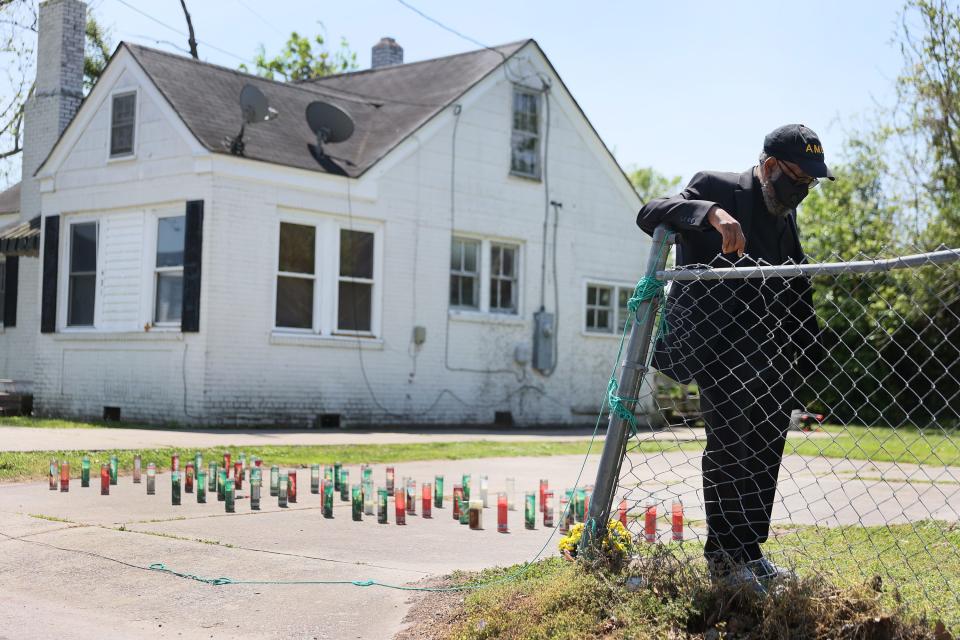 Jay McNar prays in front of the spot where Andrew Brown Jr. was killed by Pasquotank County Sheriff's deputies on April 28, 2021 in Elizabeth City, N.C. A North Carolina judge ruled that video from four body cameras showing the shooting death of Andrew Brown Jr. will not be released publicly at this time. Andrew Brown Jr. was killed on April 21 by Pasquotank County Sheriff's deputies.