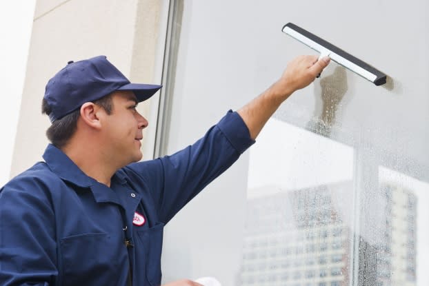 <b>If professional window cleaners use squeegees, doesn't it make sense for you to use one, too?</b> © Daniel Grill/Tetra Images/Corbis