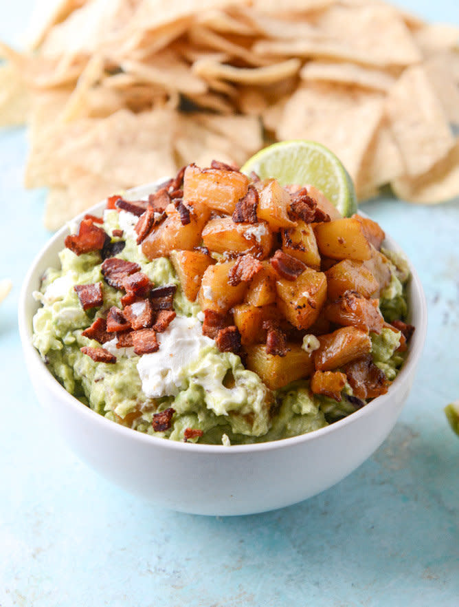 <strong>Get the <a href="http://www.howsweeteats.com/2015/03/caramelized-pineapple-bacon-and-goat-cheese-guacamole/" target="_blank">Caramelized Pineapple, Bacon and Goat Cheese Guacamole recipe</a> from How Sweet It Is</strong>
