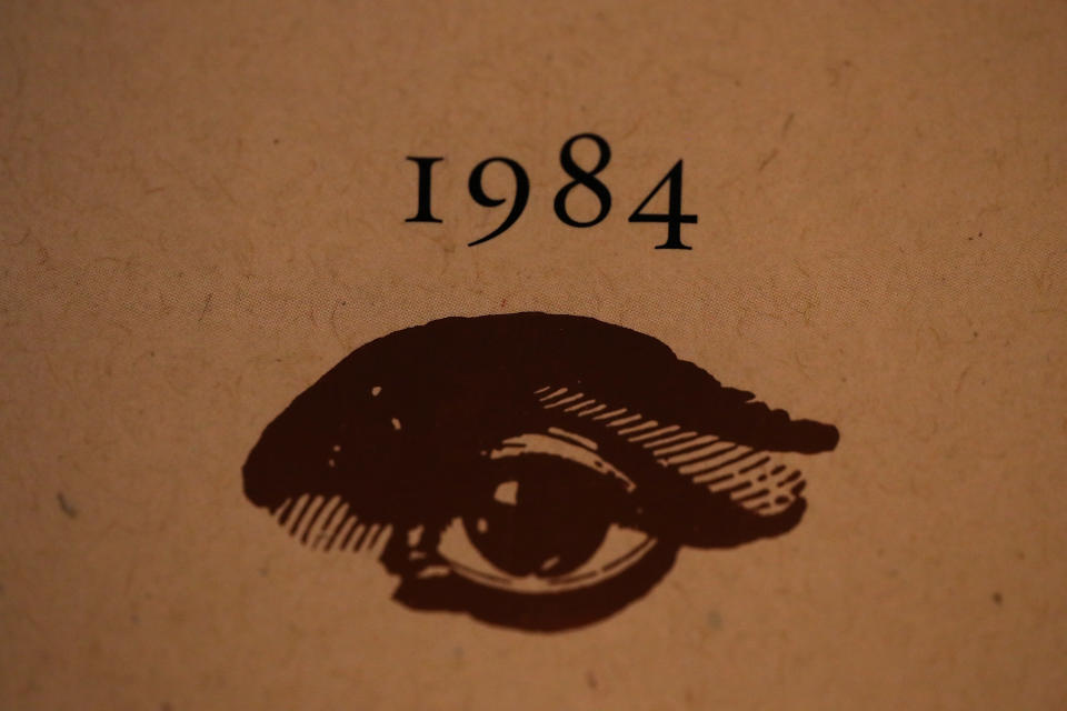 A close-up of a page featuring '1984' and a drawing of an eye