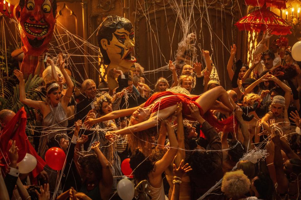 Rising star Nellie LaRoy (Margot Robbie) is the center of a raucous Hollywood party in the period film "Babylon."