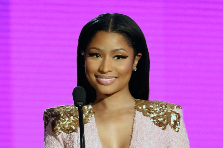 Nicki Minaj presents the award for favorite duo or group - pop/rock at the American Music Awards at the Microsoft Theater in Los Angeles, in this Sunday, Nov. 22, 2015, file photo. The 64-year-old father of rapper Nicki Minaj has died after being struck by a hit-and-run driver in New York, police said. Robert Maraj was walking along a road in Mineola on Long Island at 6:15 p.m. Friday when he was hit by a car that kept going, Nassau County police said. Maraj was taken to a hospital, where he was pronounced dead Saturday, Feb. 13, 2021. (Photo by Matt Sayles/Invision/AP, FIle)
