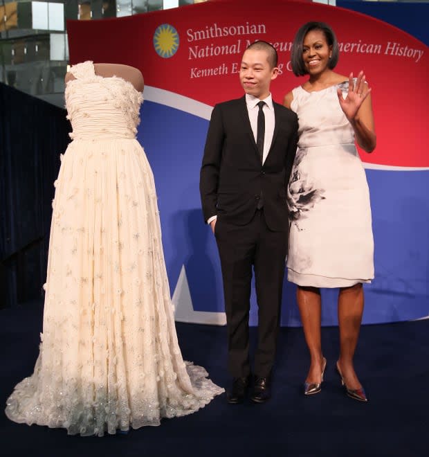 Former First Lady Michelle Obama poses (with designer Jason Wu) in a dress from Prabal Gurung's debut collection. Photo: Mark Wilson/Getty Images