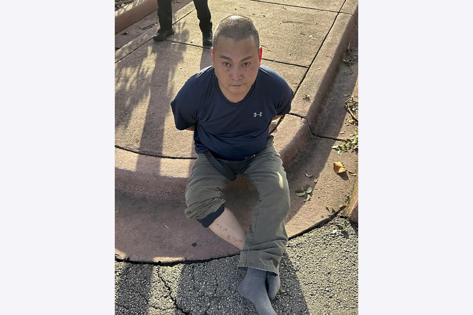 This photo released by the U.S. Marshals Service shows Wu Chen following his arrest by the Miami Beach Police on Tuesday, Nov. 22, 2022, in South Florida. Police said Wu is a suspect in the weekend killings of four people at a marijuana farm in Oklahoma. (U.S. Marshals Service via AP)