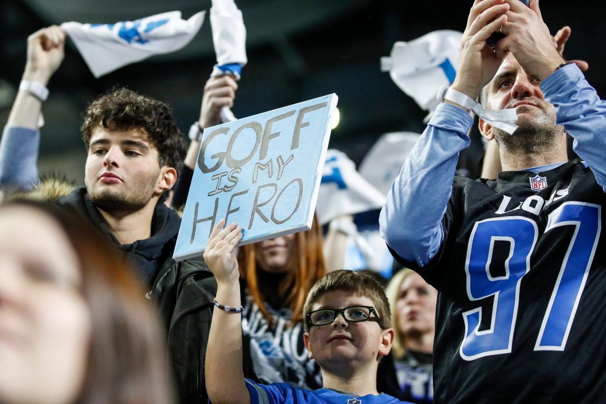 Detroit Lions fans cheer for the Lions against Tampa Bay Buccaneers during the first half of the NFC divisional round at Ford Field in Detroit on Sunday, Jan. 21, 2024.