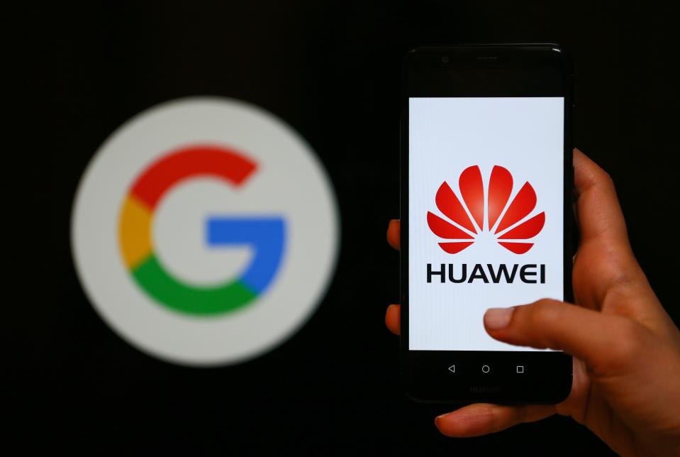 IZMIR, TURKEY - MAY 28: A person holds a Huawei mobile phone in front of logo of Google in Izmir, Turkey on May 28, 2019. (Photo by Emin Menguarslan/Anadolu Agency/Getty Images)