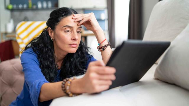 Young Woman Sitting On Pillow High-Res Stock Photo - Getty Images