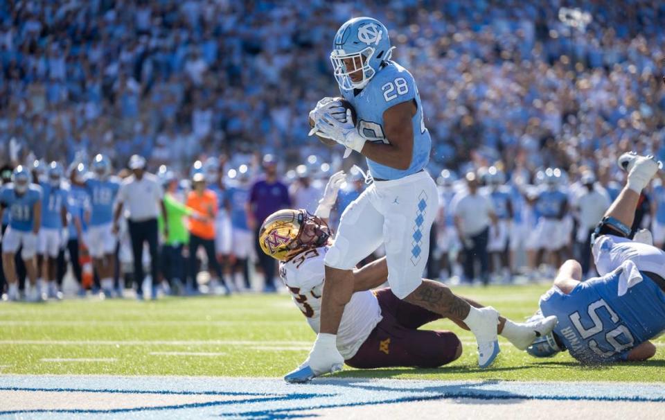 North Carolina running back Omarion Hampton (28) scores a touchdown on a 1-yard run in the second quarter to give the Tar Heels’ a 14-0 lead over Minnesota on Saturday, September 16, 2023 at Kenan Stadium in Chapel Hill N.C.