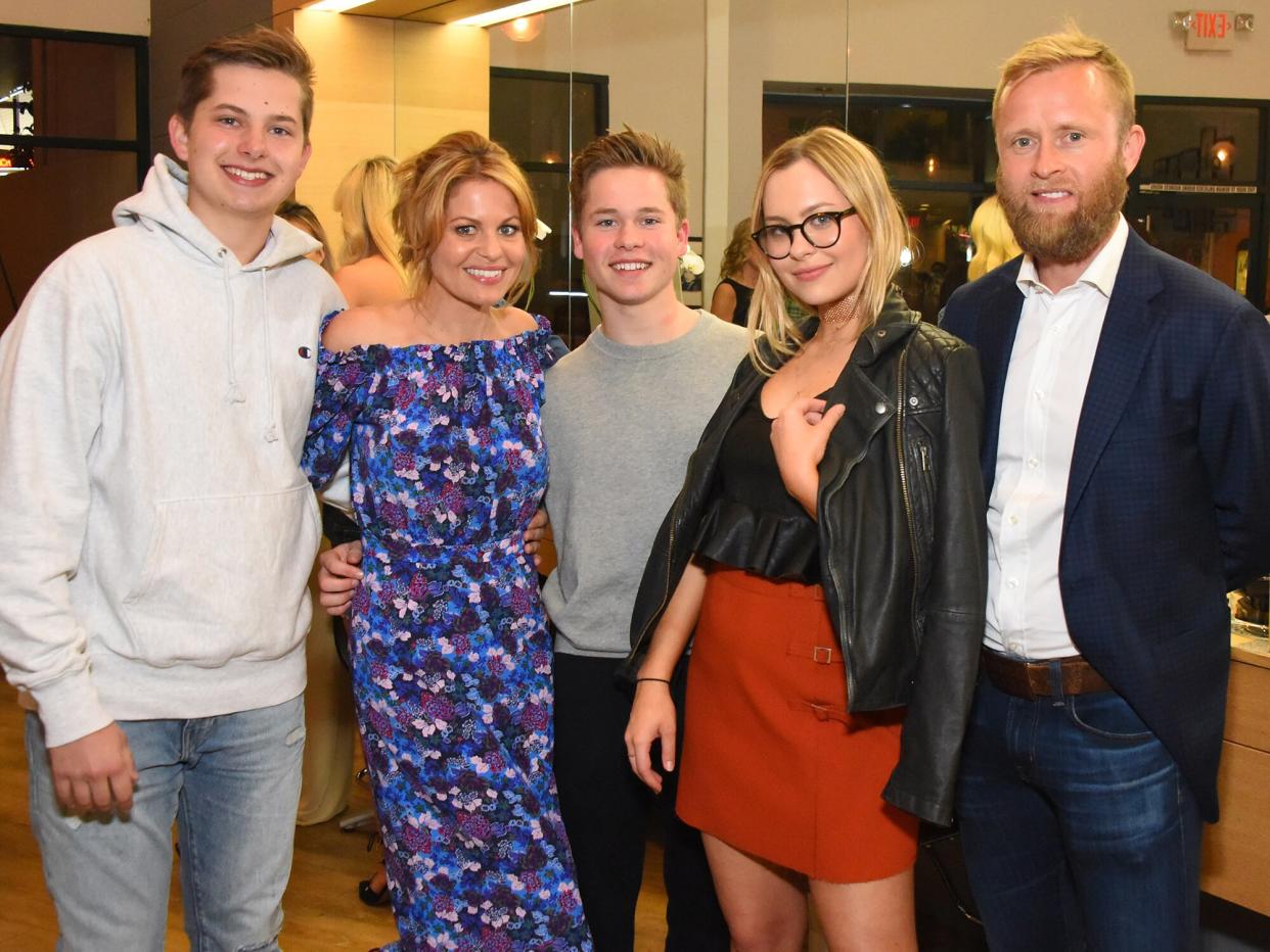 Lev Bure, Candace Cameron, Maksim Bure, Natasha Bure and Valeri Bure attend Natasha Bure "Let's Be Real" Los Angeles book launch party at Eden By Eden Sassoon on March 24, 2017 in Los Angeles, California