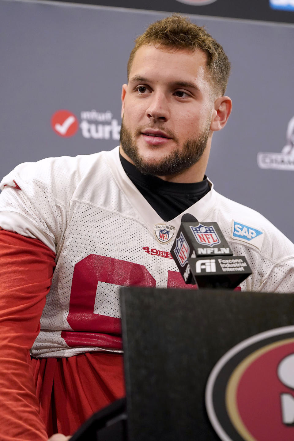 San Francisco 49ers defensive end Nick Bosa talks to reporters before their NFL football practice in Santa Clara, Calif., Wednesday, Jan. 15, 2020. The 49ers will host the Green Bay Packers for the NFC Championship on Sunday. (AP Photo/Tony Avelar)