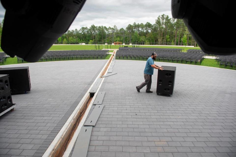 Workers prep for the opening of The Sound Amphitheater in Gautier on Thursday, April 11, 2024. The new venue will host its first concert, KC and The Sunshine Band, on Friday, April 12.