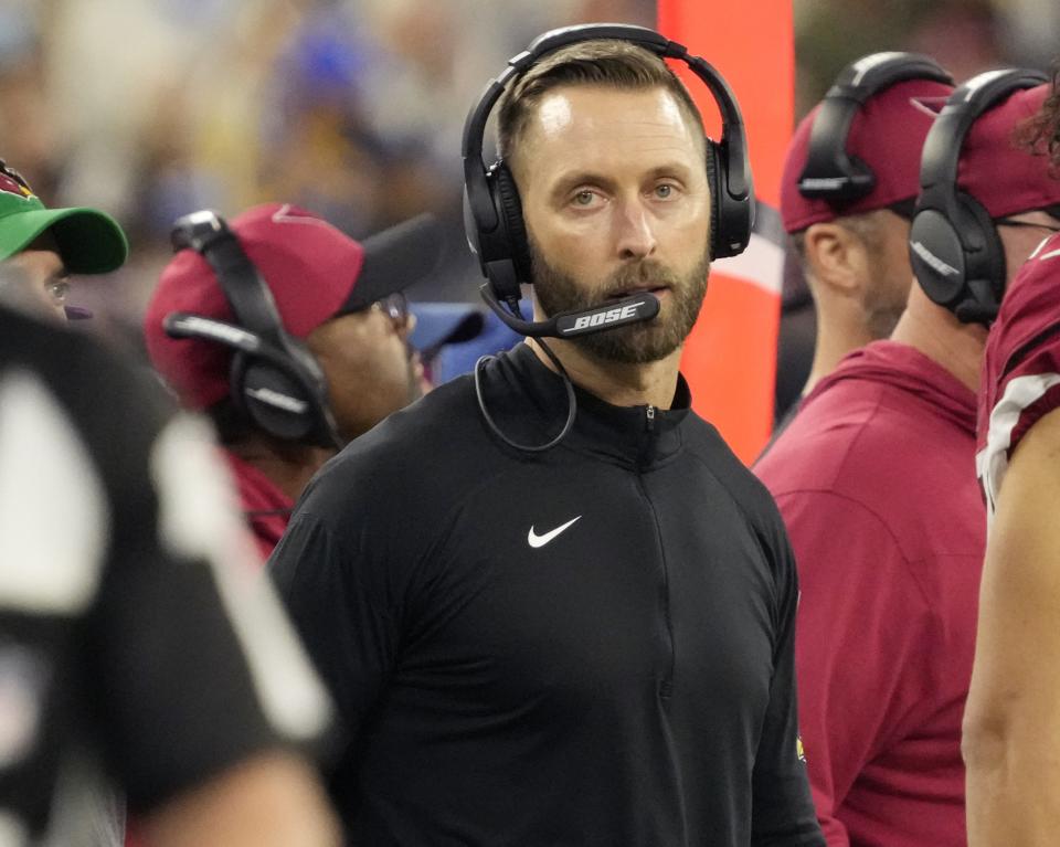 Jan 17, 2022; Los Angeles, California, USA;  Arizona Cardinals head coach Kliff Kingsbury watches his team play against the Los Angeles Rams during the first quarter of the NFC Wild Card playoff game.