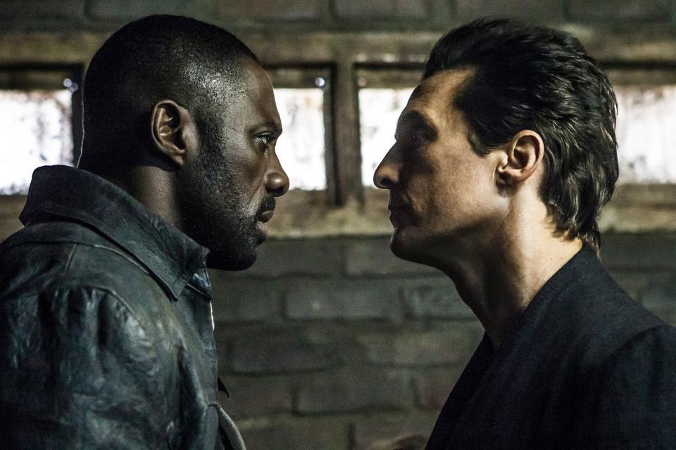 The gunslinger Roland (Idris Elba, left) faces off with the Man in Black (Matthew McConaughey) in "The Dark Tower," based on the Stephen King book.