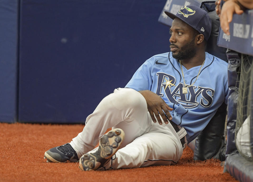 Tampa Bay Rays designated hitter Randy Arozarena watches his team play against the Baltimore Orioles during the ninth inning of a baseball game Sunday, June 13, 2021, in St. Petersburg, Fla. (AP Photo/Steve Nesius)