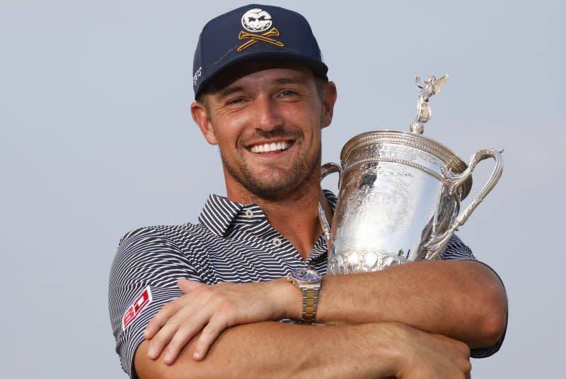 Bryson DeChambeau holds his trophy after winning 2024 U.S. Open on Sunday at Pinehurst Resort & Country Club in Pinehurst, N.C. Photo by John Angelillo/UPI