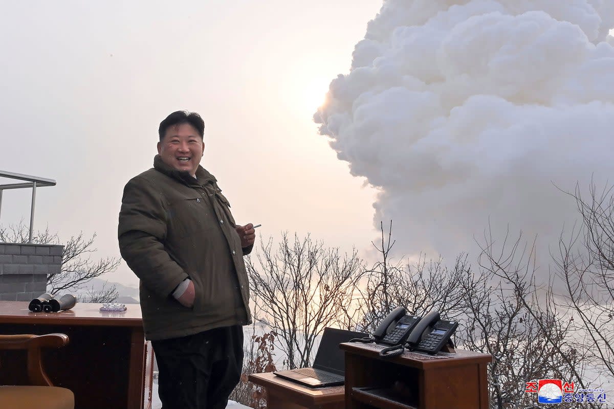 North Korean leader Kim Jong Un supervise what it says a test of “high-thrust solid-fuel motor” at the Sohae satellite launching ground in North Korea  (KCNA via KNS)