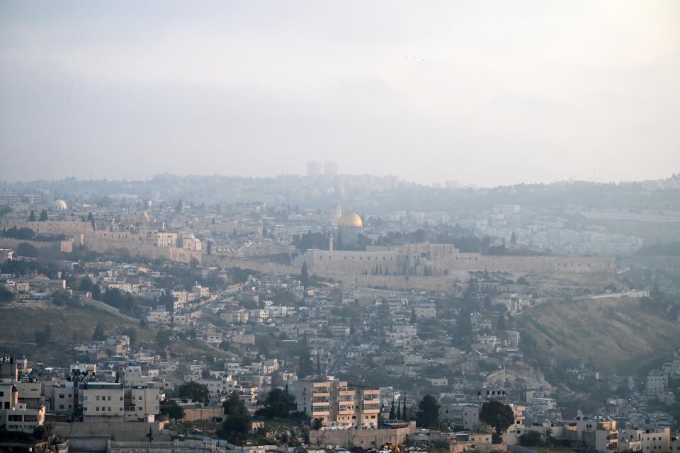 A panoramic view of Jerusalem’s Old City is pictured at dawn of 14 April 2024 (AFP via Getty Images)