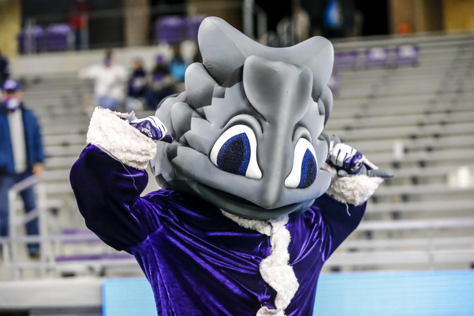 FORT WORTH, TX - DECEMBER 12: The TCU Horned Frogs mascot "Superfrog" poses for pictures dressed as Santa Claus during the game between the TCU Horned Frogs and the Louisiana Tech Bulldogs on December 12, 2020 at Amon G. Carter Stadium in Fort Worth, Texas. (Photo by Matthew Pearce/Icon Sportswire via Getty Images)