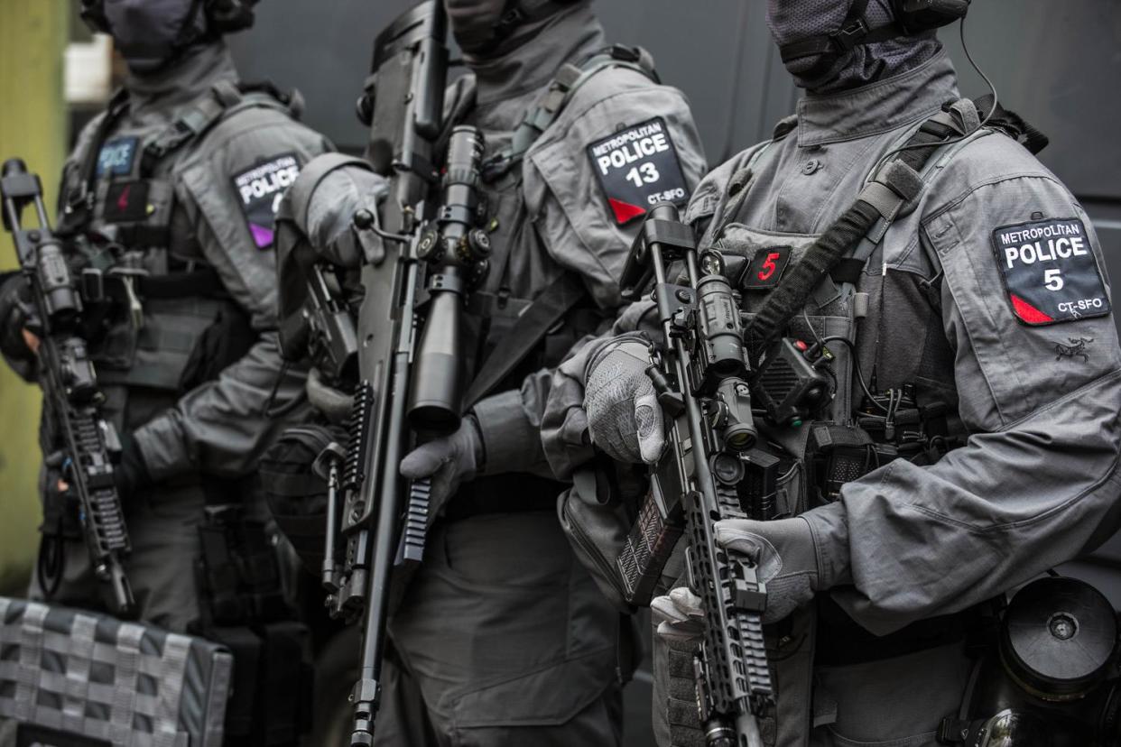 Anti-terror police: Officers stormed a number of homes in London: Lucy Young