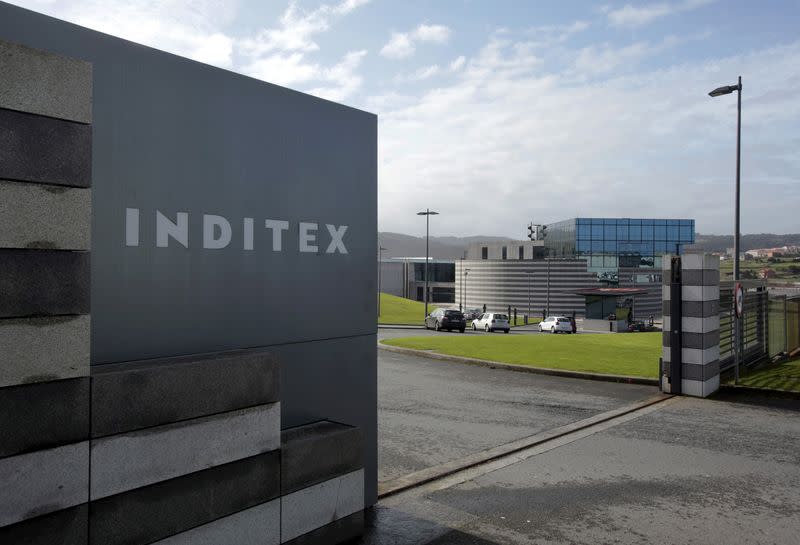 FILE PHOTO: An Inditex logo is seen at the entrance of a Zara factory, the headquarters of Inditex group, in Arteixo