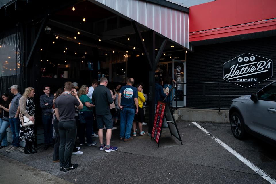 Hot chicken fans line up for lunch at Hattie B's Hot Chicken Midtown in Nashville, Tenn., Tuesday, April 2, 2024.