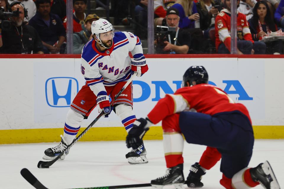 May 28, 2024; Sunrise, Florida, USA; New York Rangers center Vincent Trocheck (16) moves the puck against the Florida Panthers during the first period in game four of the Eastern Conference Final of the 2024 Stanley Cup Playoffs at Amerant Bank Arena. Mandatory Credit: Sam Navarro-USA TODAY Sports